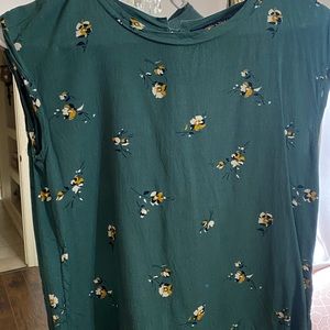 Sleeveless green blouse